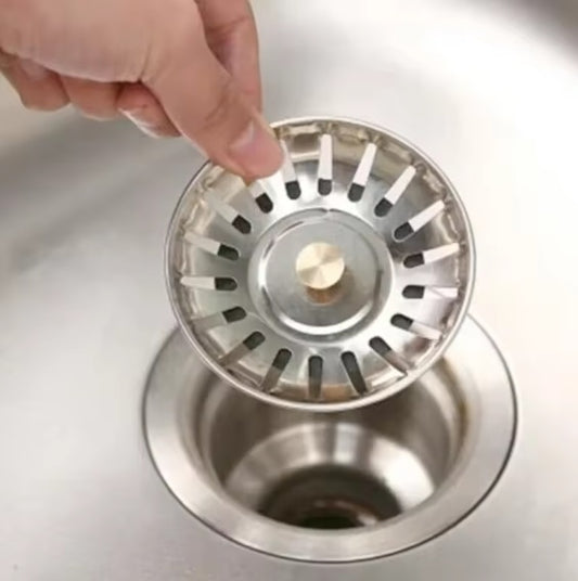Tapón y colador metálico para lavaplatos