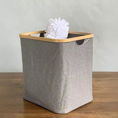 Cesto rectangular de tela y bambú abierto